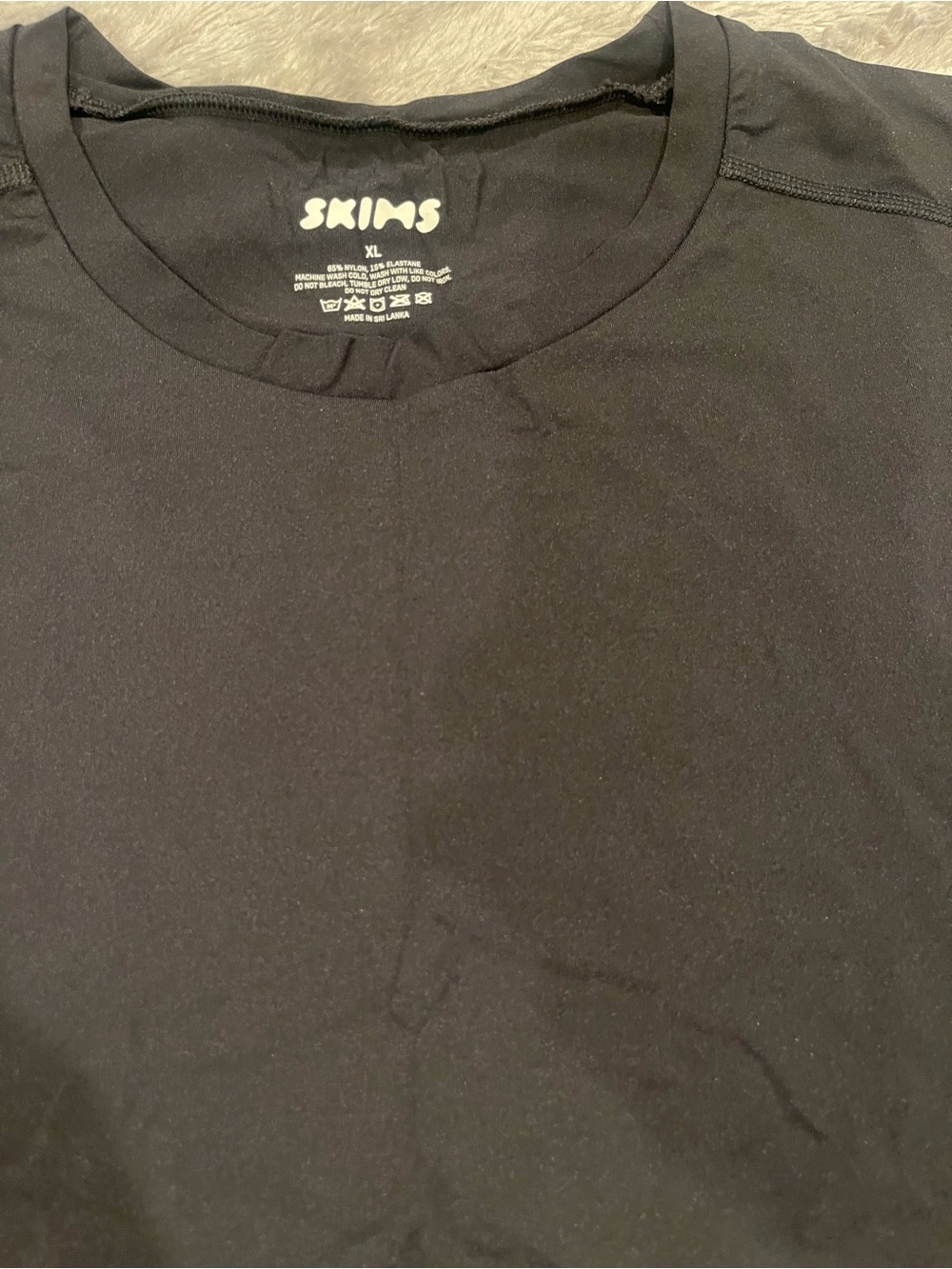 Skims Sport Slim Muscle Tank - Picture 5 of 5